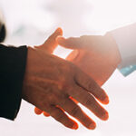 Close-up of business people hands shaking